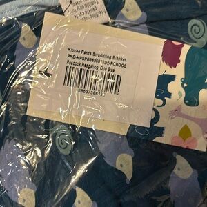 Kickee Pants swaddle blanket in peacock hedgehog, NWT